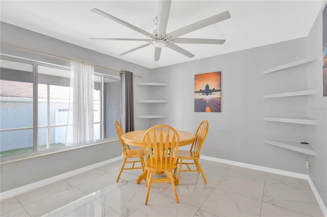 dining space featuring ceiling fan