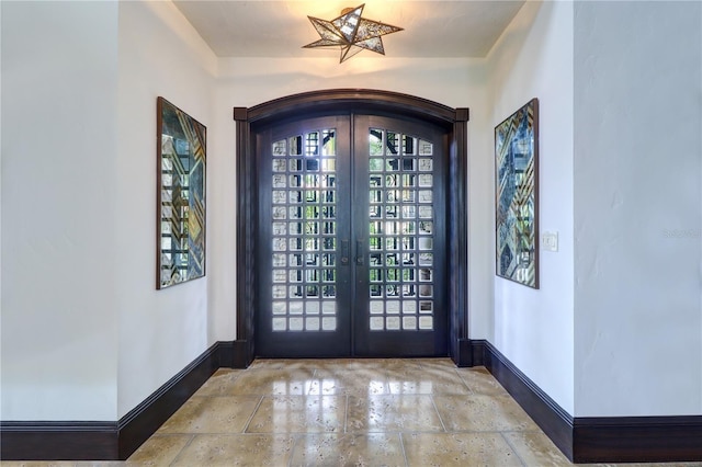 entrance foyer featuring french doors