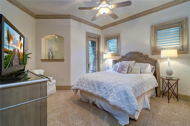 bedroom with crown molding, light carpet, and ceiling fan