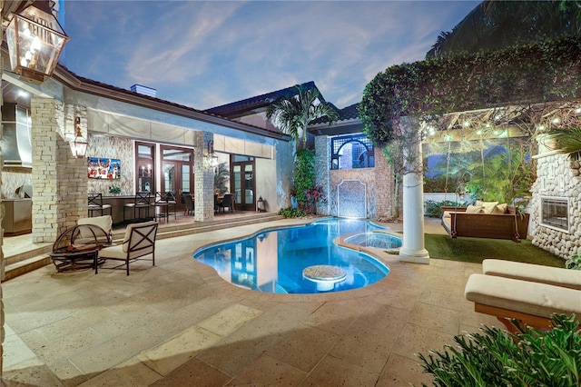 view of pool featuring a patio area and outdoor lounge area