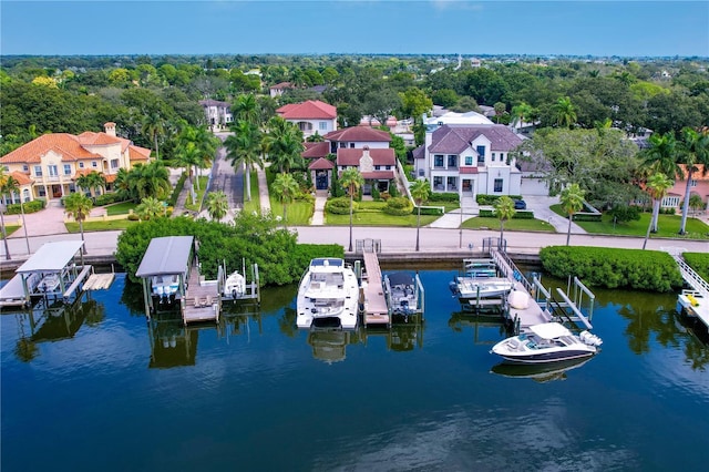 birds eye view of property featuring a water view