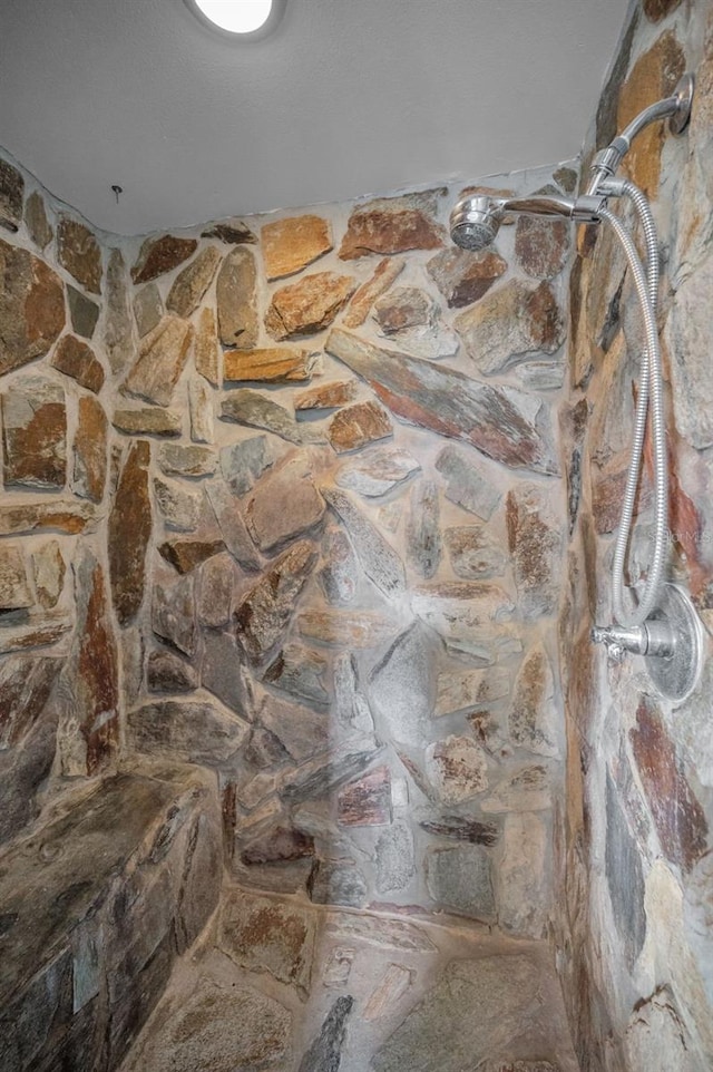 interior details featuring walk in shower