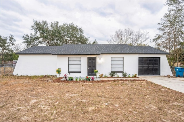 single story home with a garage