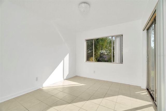 view of tiled spare room