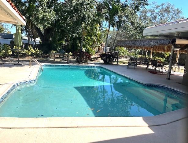 view of pool with a fenced in pool and a patio area