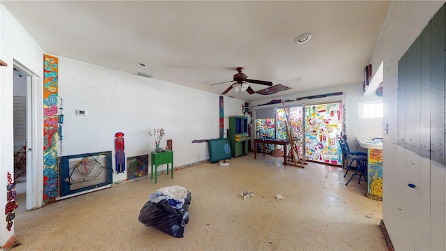 interior space featuring ceiling fan