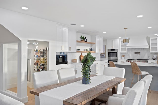 dining area featuring light hardwood / wood-style flooring