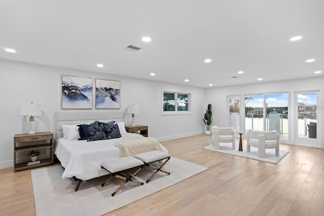 bedroom with light hardwood / wood-style floors