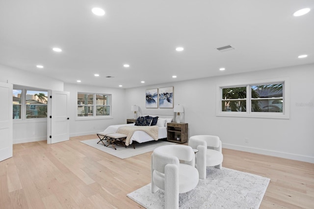 bedroom with light wood-type flooring