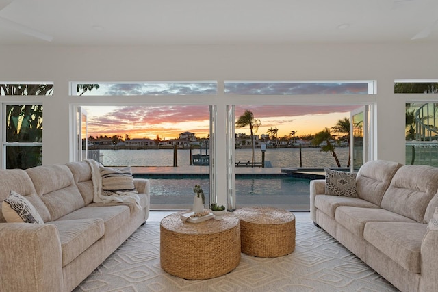 living room featuring a water view