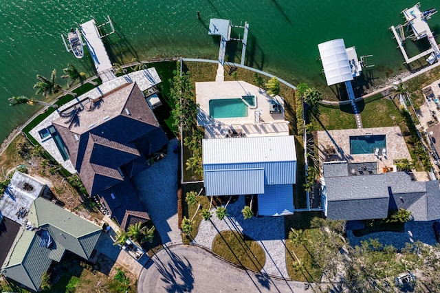 drone / aerial view with a water view