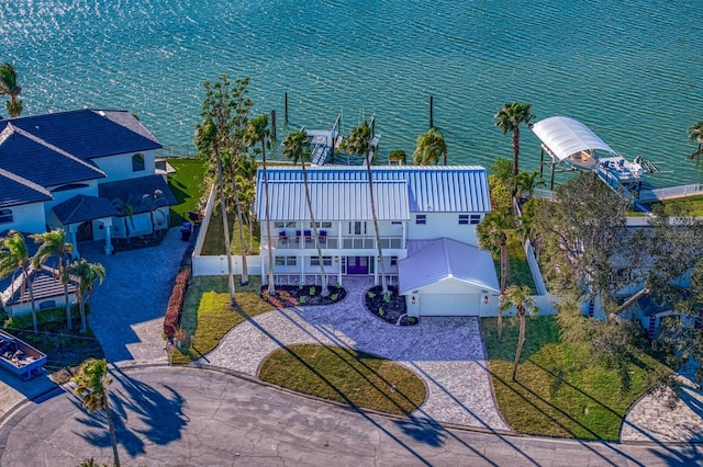 birds eye view of property featuring a water view