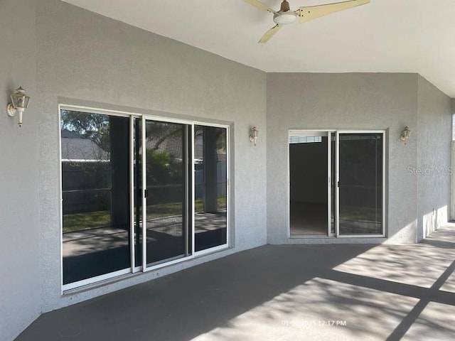 view of patio with ceiling fan