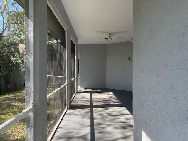 view of patio / terrace featuring ceiling fan