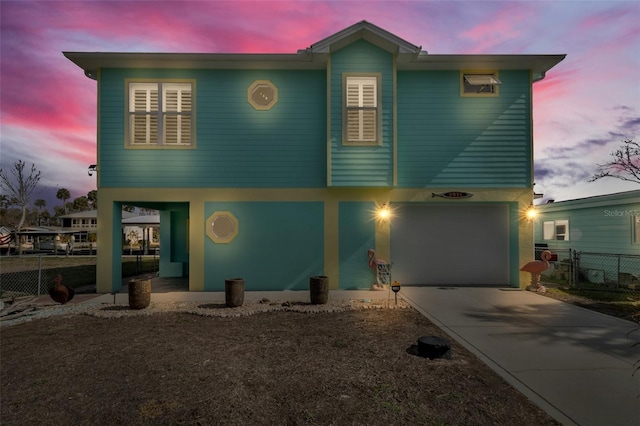 view of front of home with a garage