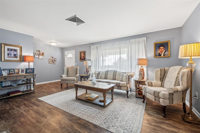 living room with dark hardwood / wood-style floors