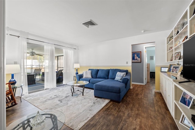 living room with dark hardwood / wood-style floors