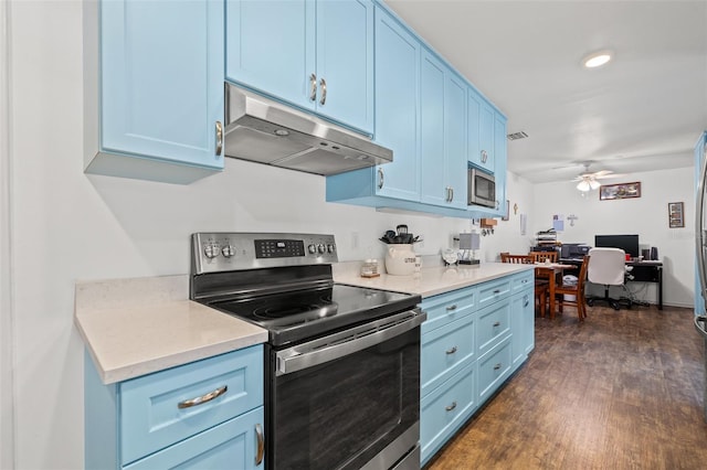 kitchen featuring ceiling fan, appliances with stainless steel finishes, and blue cabinets