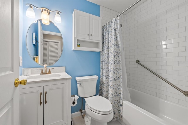 full bathroom with vanity, shower / bath combo, and toilet