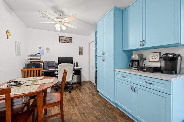 interior space with dark hardwood / wood-style floors and ceiling fan