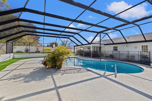 view of pool featuring a lanai and a patio