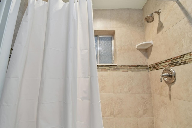 bathroom featuring a shower with curtain