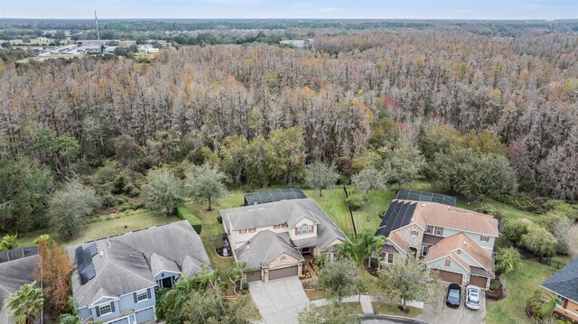 bird's eye view with a residential view and a view of trees