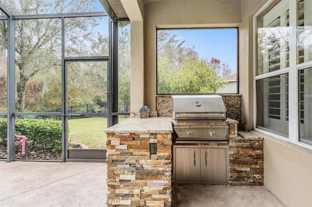 exterior space featuring area for grilling, a grill, and a lanai