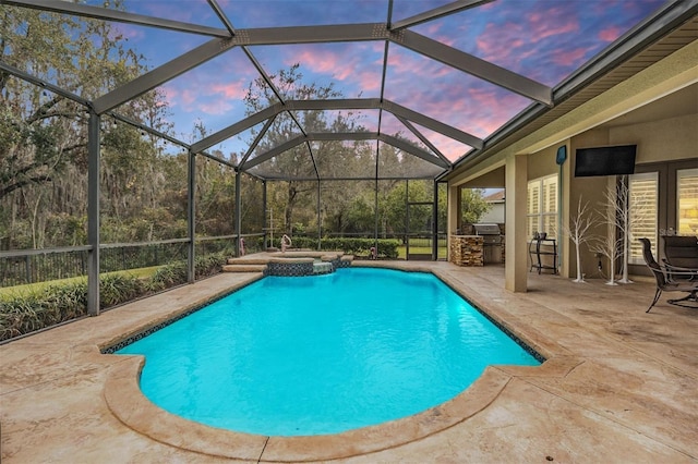 view of pool featuring a patio area and a pool with connected hot tub