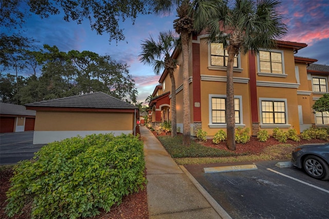 view of property exterior at dusk