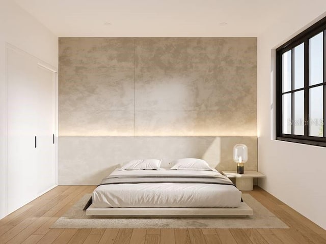 bedroom featuring light wood-type flooring