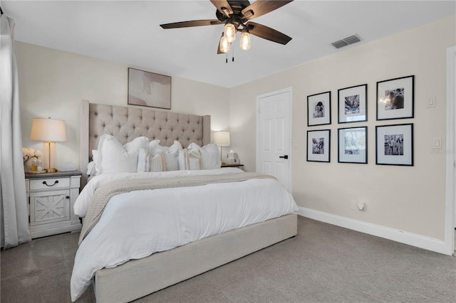 carpeted bedroom featuring baseboards, visible vents, and ceiling fan