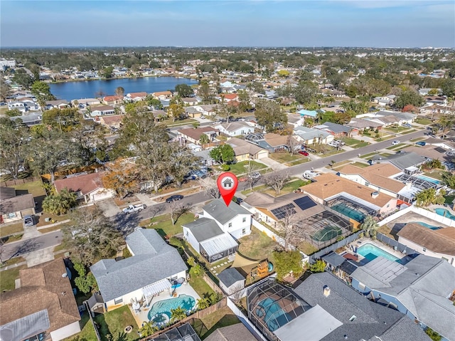 aerial view featuring a residential view and a water view