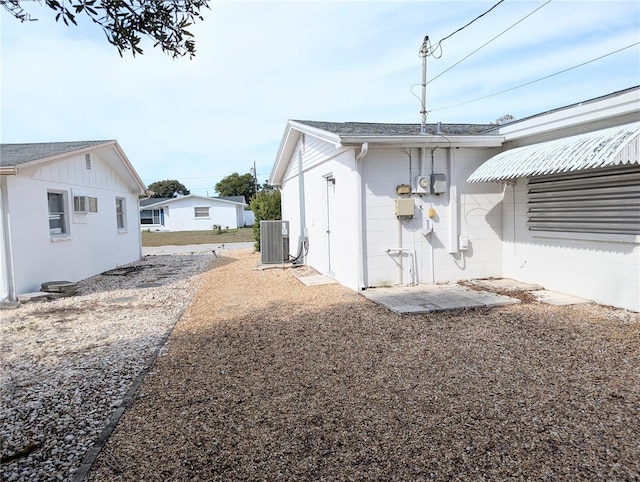 view of home's exterior featuring central AC unit