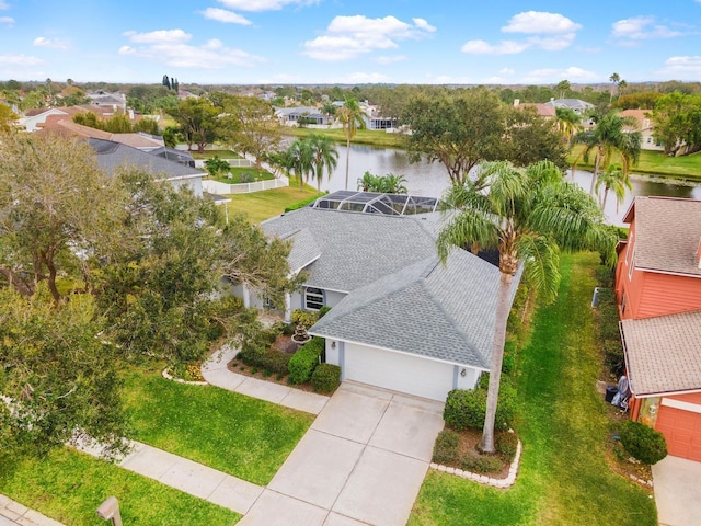 birds eye view of property featuring a water view