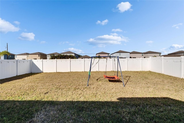 view of play area with a yard