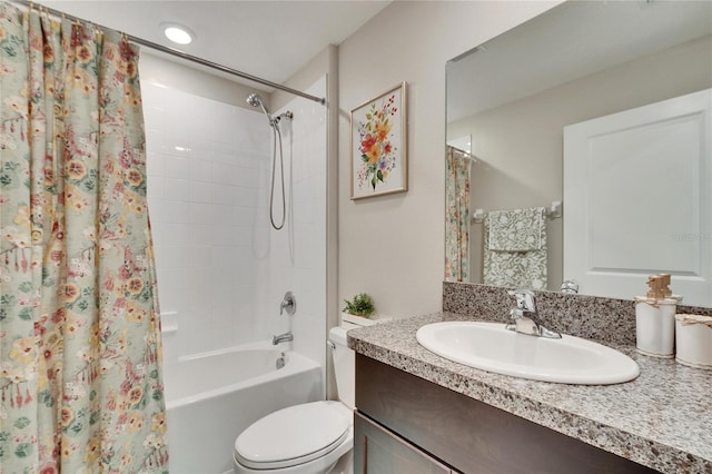 full bathroom with toilet, vanity, and shower / bath combination with curtain