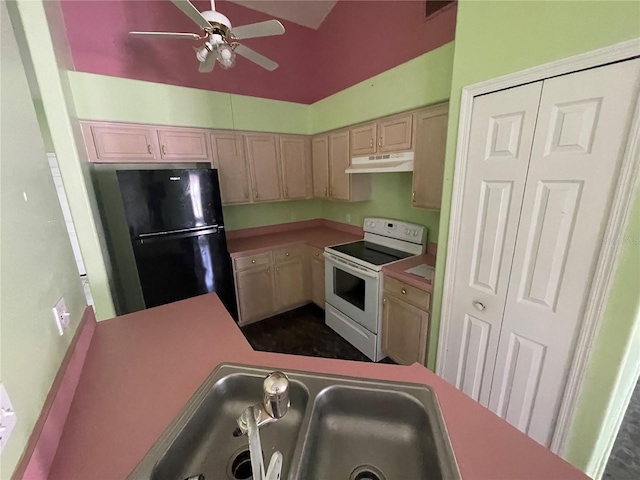 kitchen featuring electric stove, sink, ceiling fan, black refrigerator, and light brown cabinets