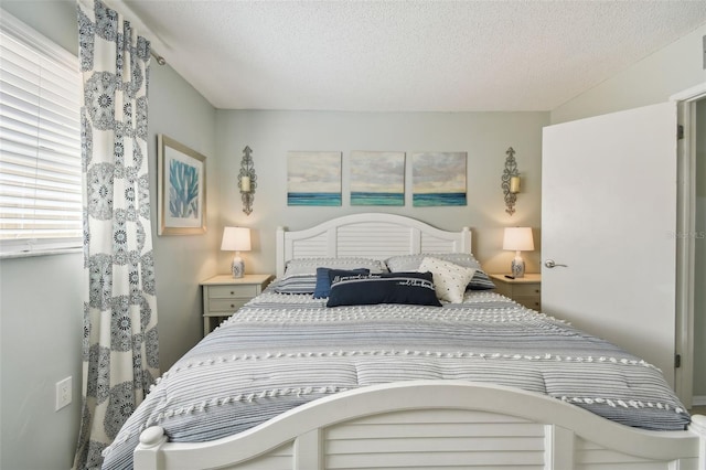 bedroom featuring a textured ceiling