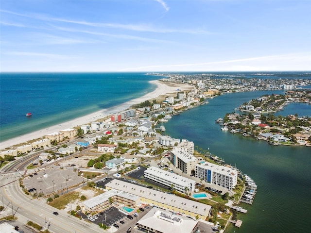 bird's eye view featuring a water view and a view of the beach