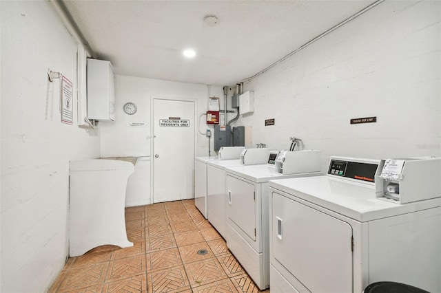 washroom featuring washer and clothes dryer