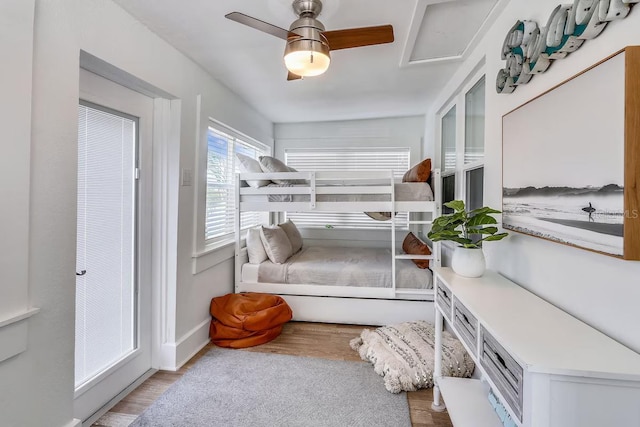 interior space with ceiling fan and light hardwood / wood-style flooring