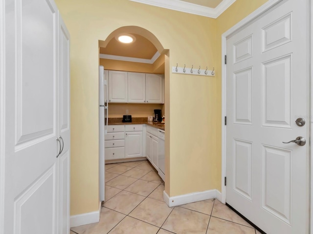 19417 Gulf Blvd Unit B205, Indian Rocks Beach, FL 33785 - interior space with arched walkways, crown molding, baseboards, and light tile patterned floors