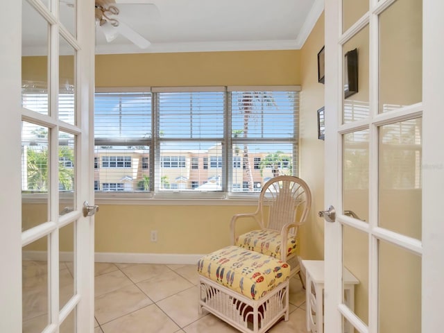 19417 Gulf Blvd Unit B205, Indian Rocks Beach, FL 33785 - sunroom / solarium featuring baseboards, crown molding, and tile patterned flooring