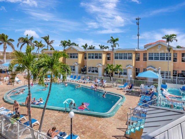 19417 Gulf Blvd Unit B205, Indian Rocks Beach, FL 33785 - community pool featuring fence and a patio area