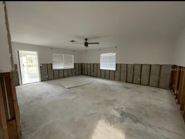 interior space featuring ceiling fan