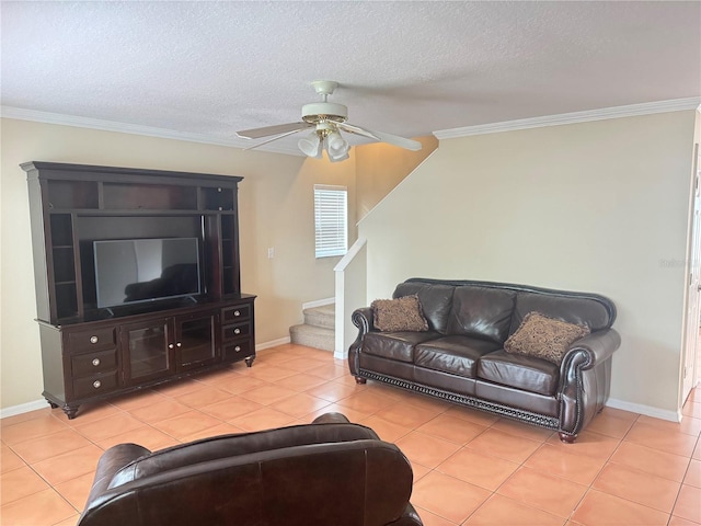 living room featuring crown molding, a textured ceiling, ceiling fan, and light tile patterned flooring