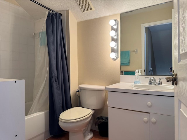 full bathroom with shower / bathtub combination with curtain, vanity, toilet, and a textured ceiling