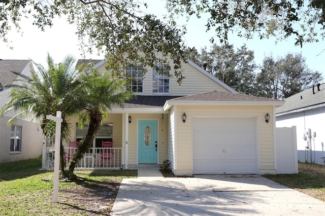 view of front of home featuring a garage and a porch