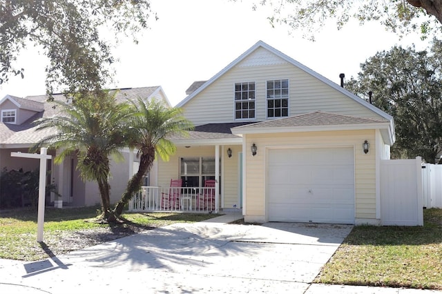 view of front of house with a garage and covered porch